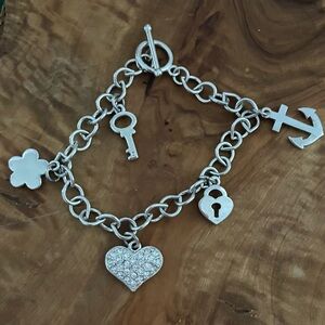Charm Bracelet silver tone Charms on Link chain heart, Anchor, Key, Flower, lock